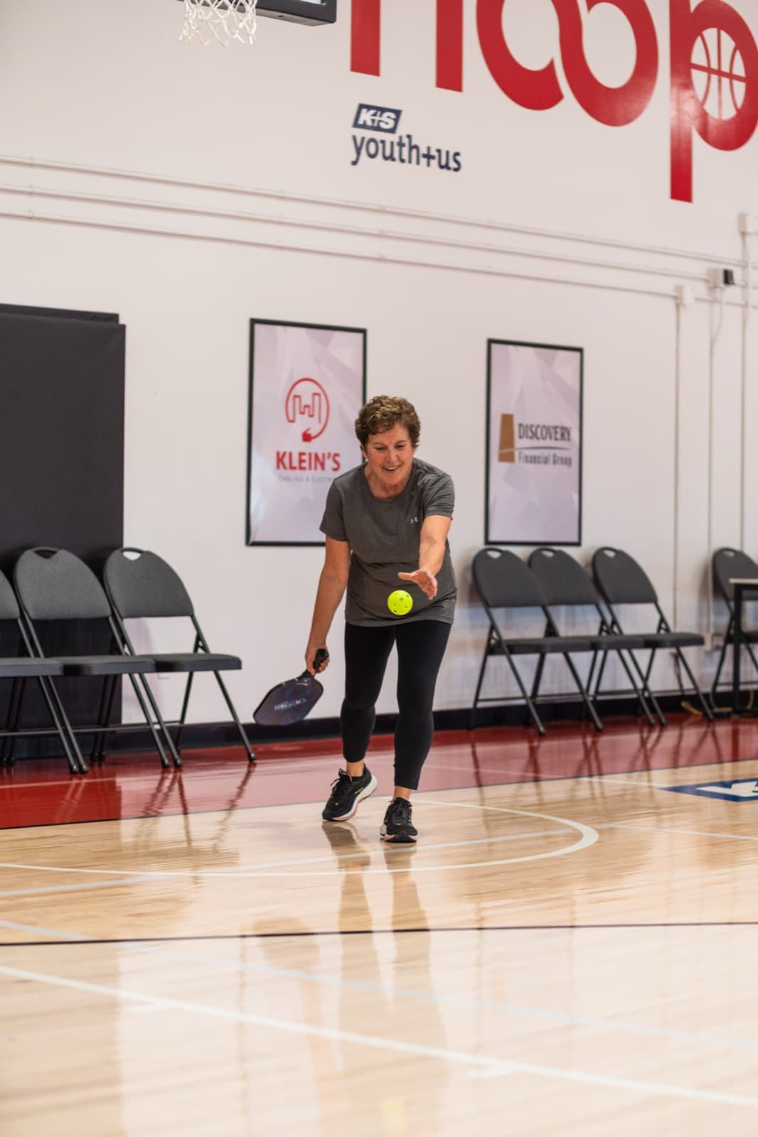 A Prairie Pickleball member returning the ball at the HoopLife Centre in Regina